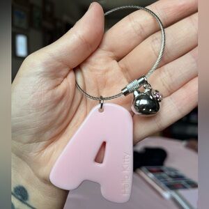 Brand New. Sanrio Hello Kitty letter A Keychain.